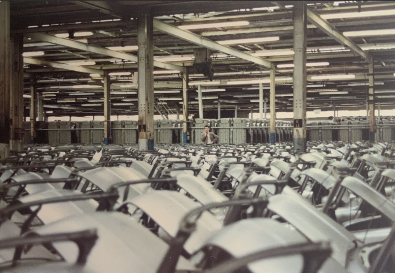 John Barron standing among Mini body assemblies at Speke No. 1 plant in 1982.