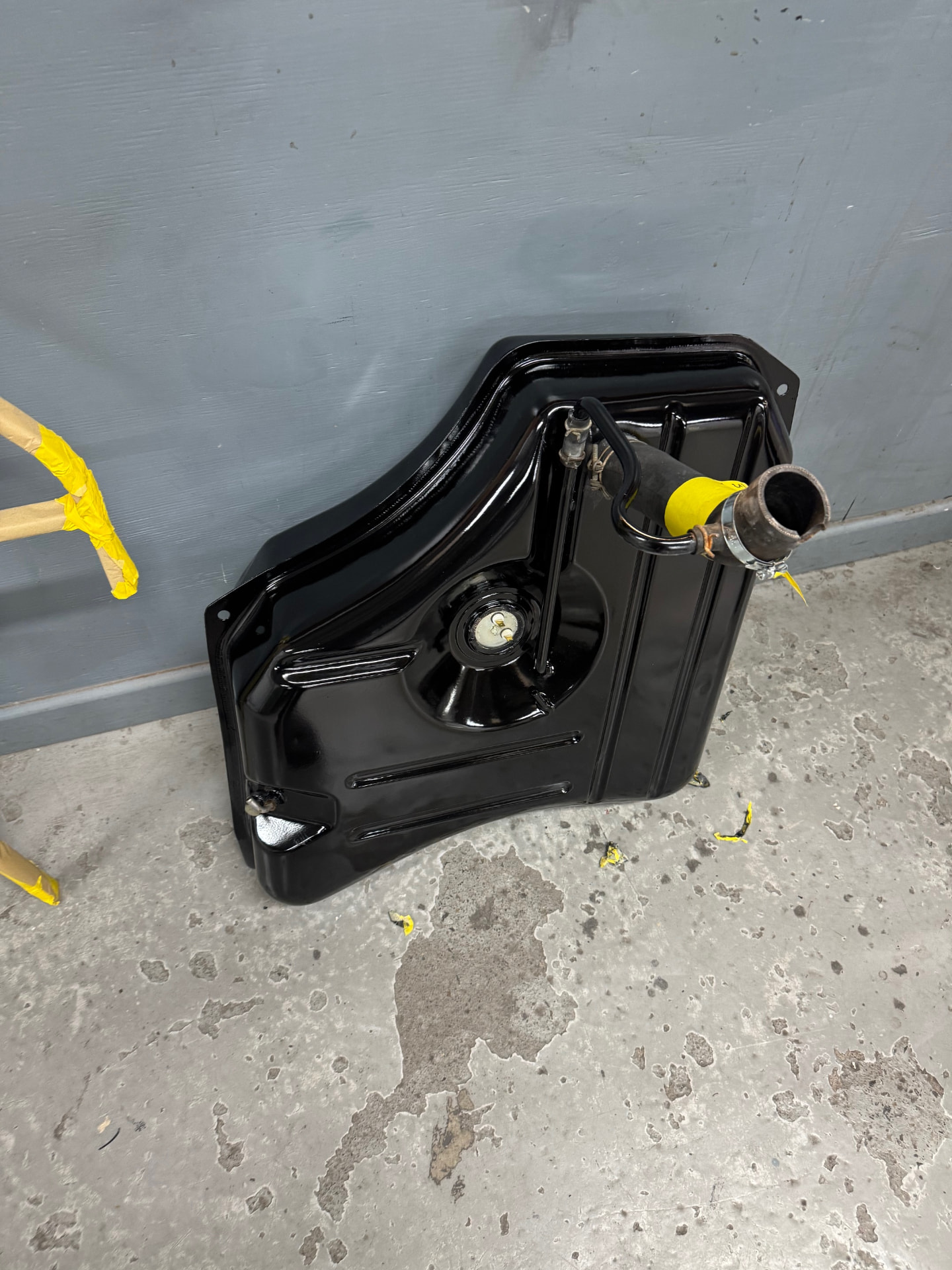 The Stag fuel tank after it was removed, stripped and coated.